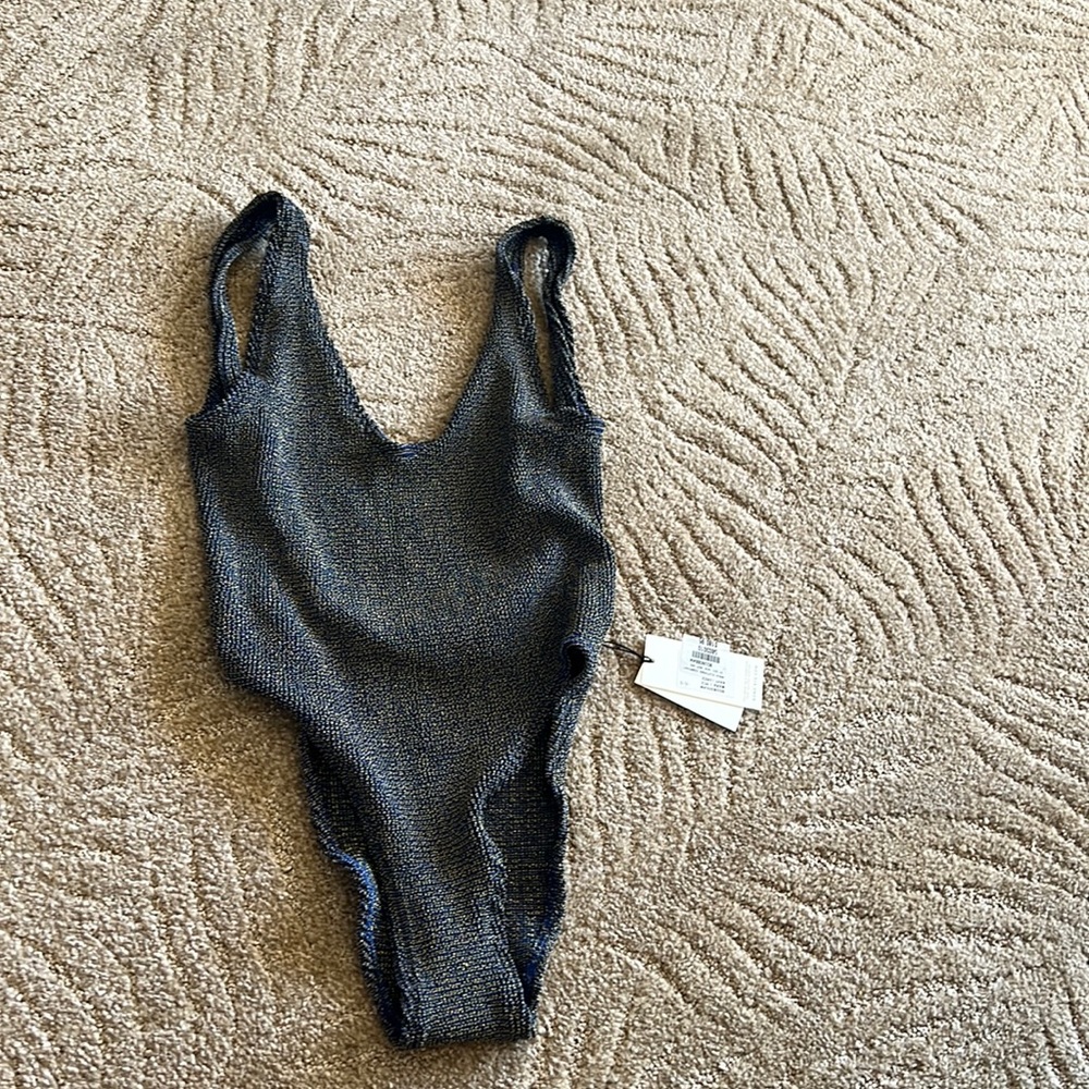Bond eye swimsuit. One piece. One size fits all. Never worn.